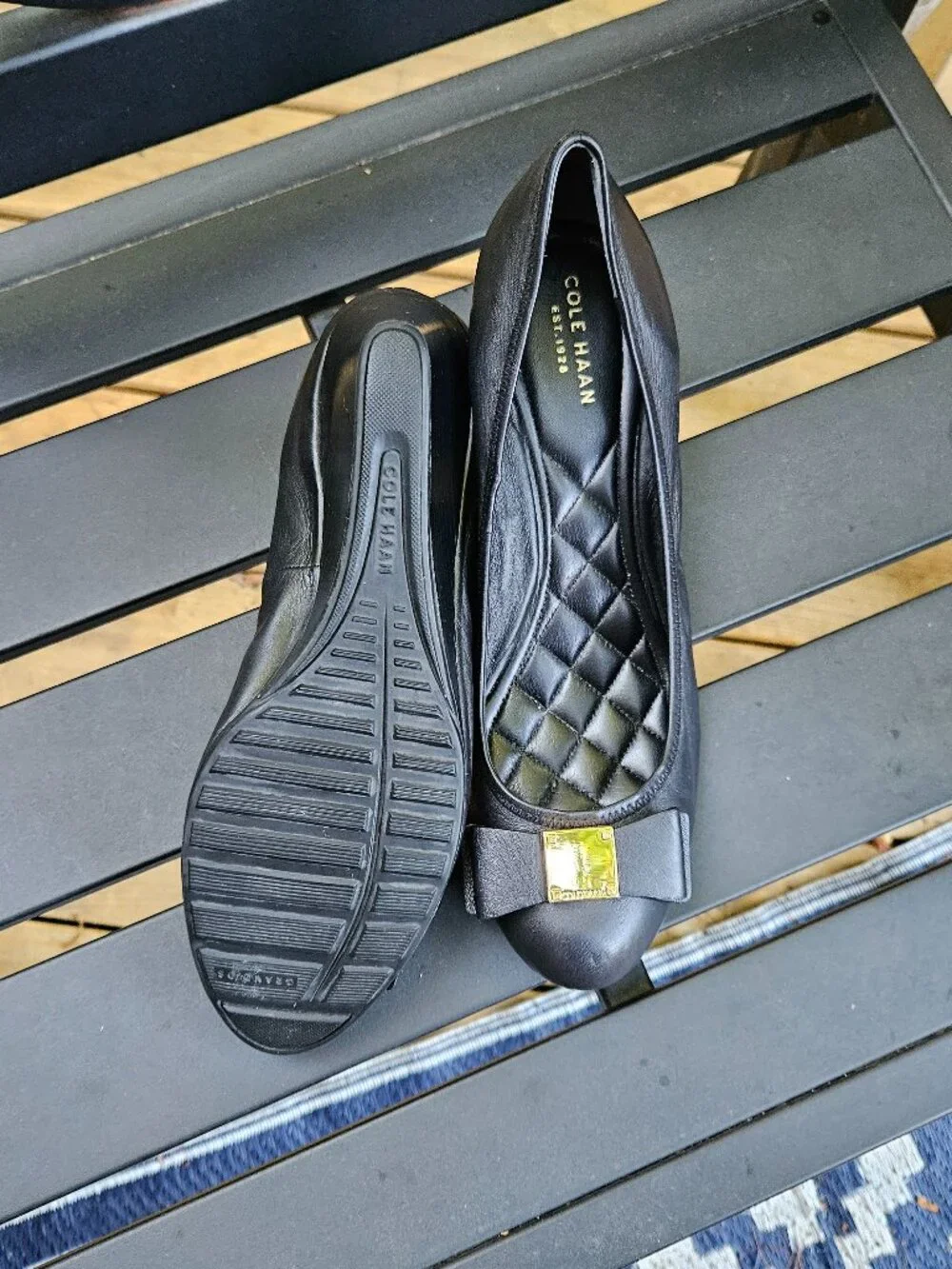 Cole Haan Black Leather Wedge Pumps with Gold Bow Accent